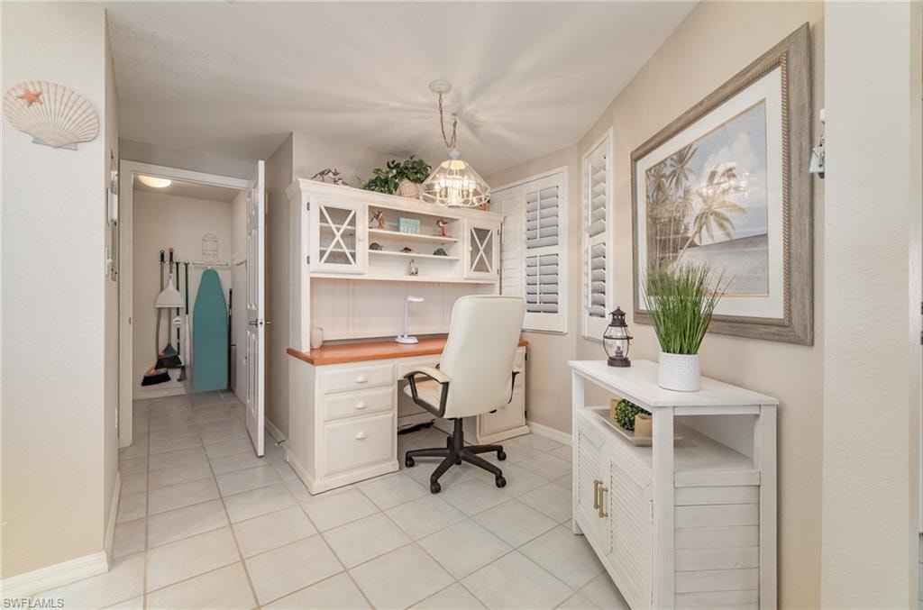 Office space with light tile patterned floors