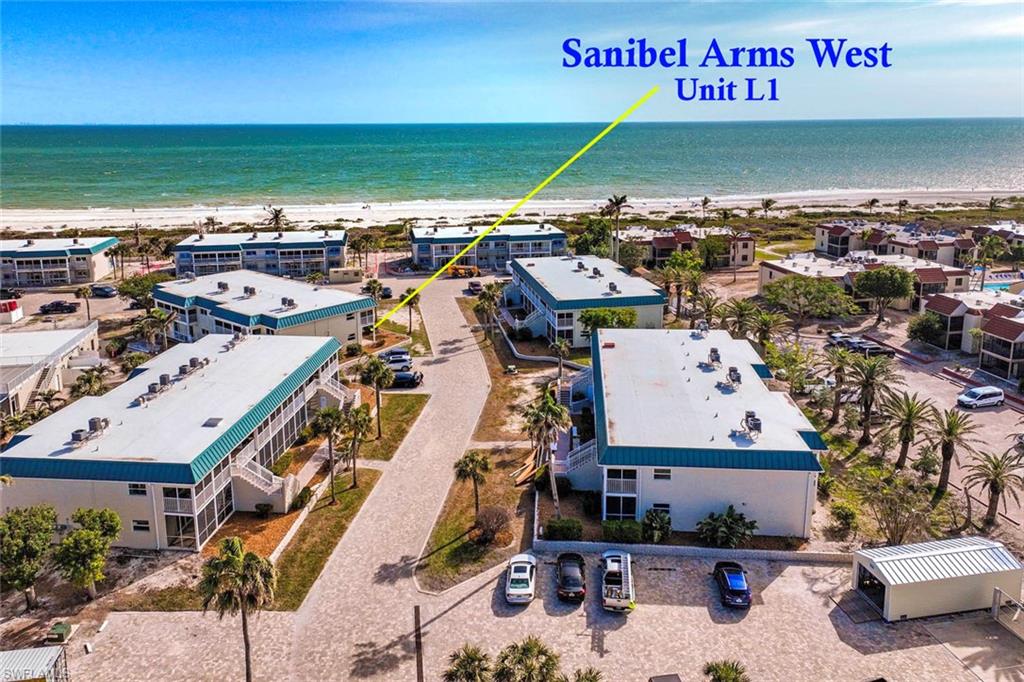 Bird's eye view with a beach view and a water view