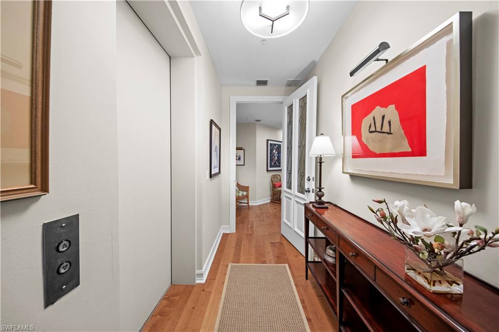 Hallway featuring light wood-type flooring