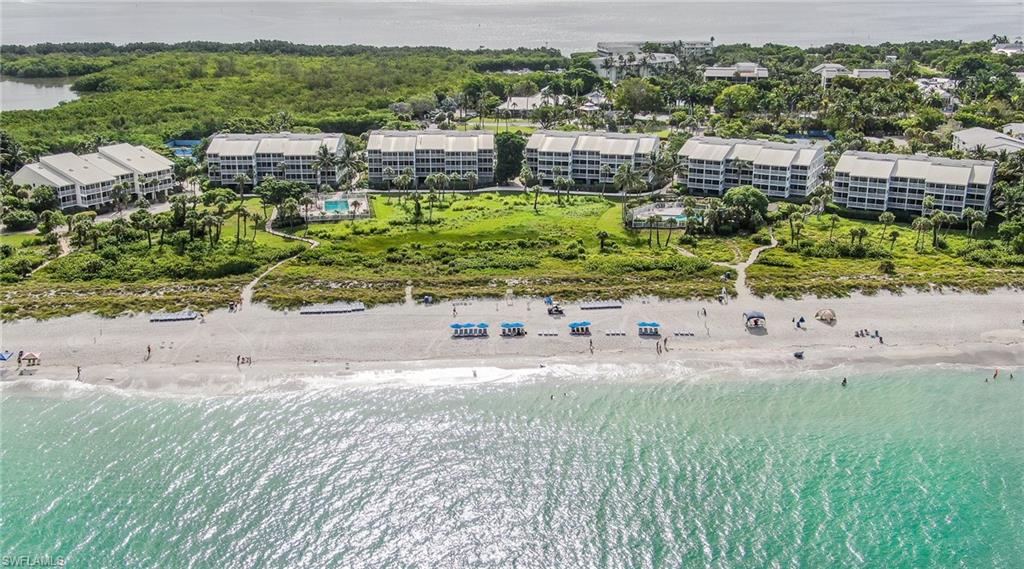Aerial view with a view of the beach and a water view