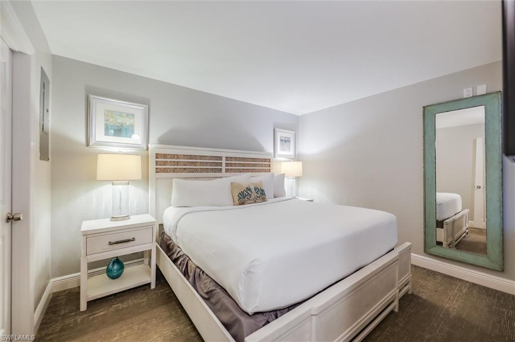 Bedroom featuring dark wood-type flooring
