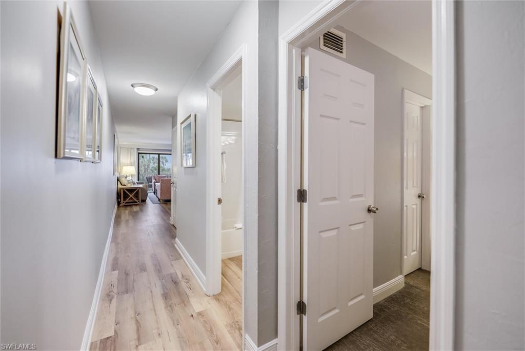 Hallway featuring light hardwood / wood-style floors
