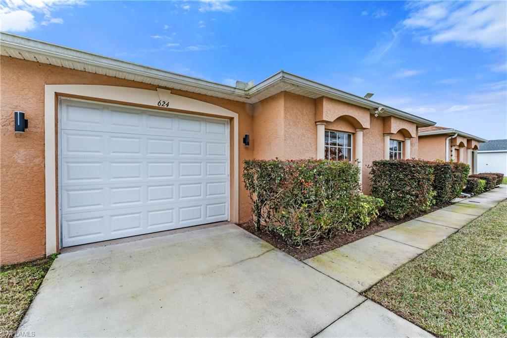 Single story home featuring a garage