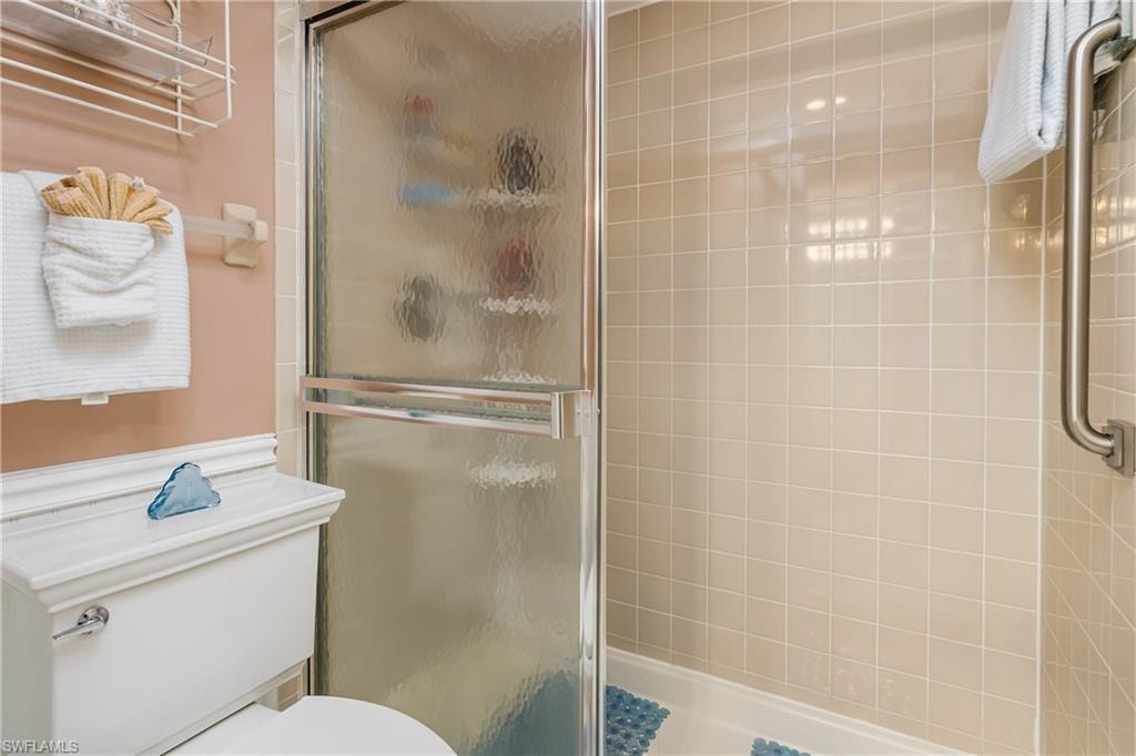 Primary bathroom has been updated and has large walk-in shower