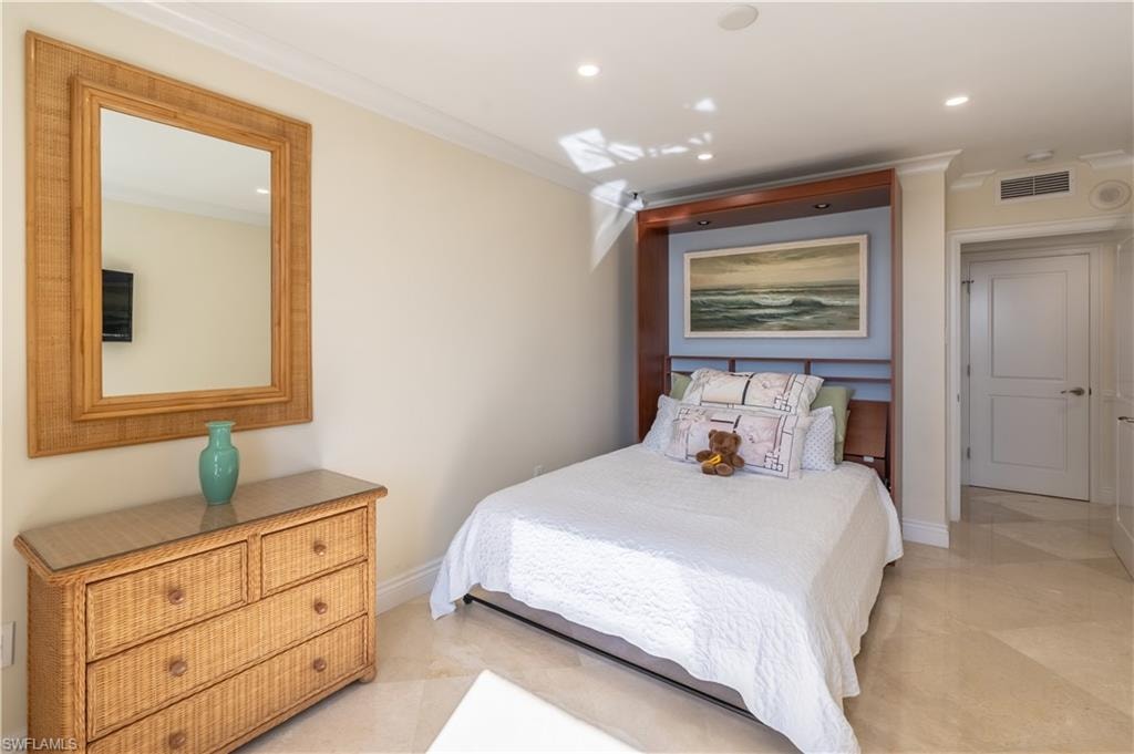 Bedroom with crown molding