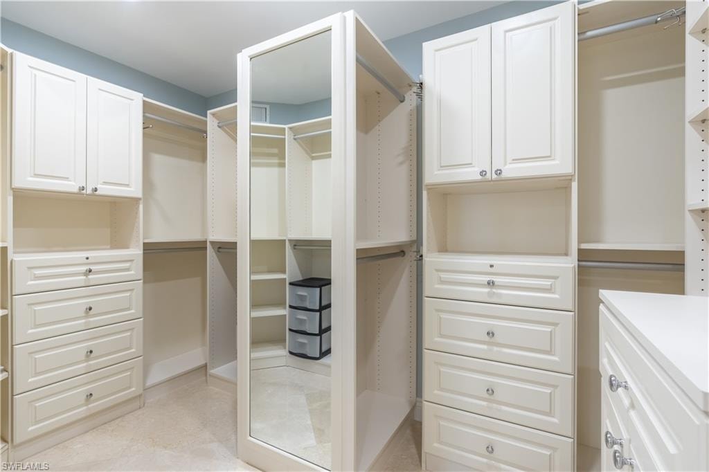 Walk in closet featuring light tile patterned floors