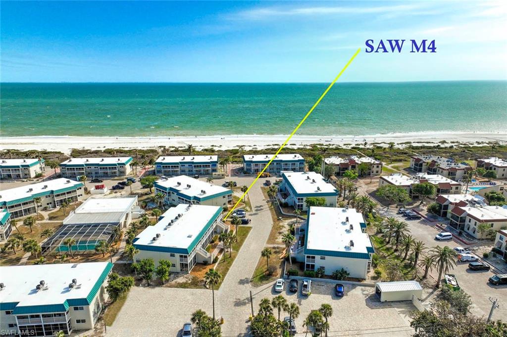Aerial view with a view of the beach and a water view