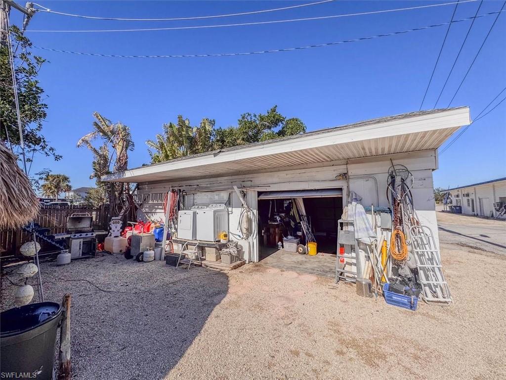 Garage with washing machine and dryer