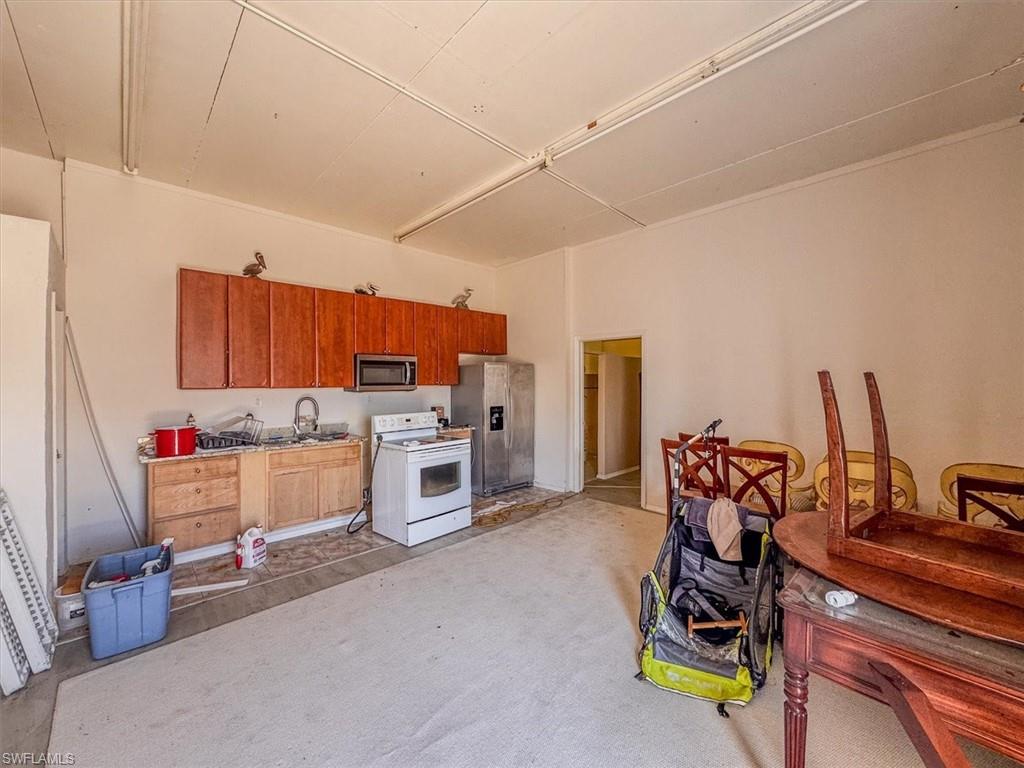 Kitchen with stainless steel appliances and sink