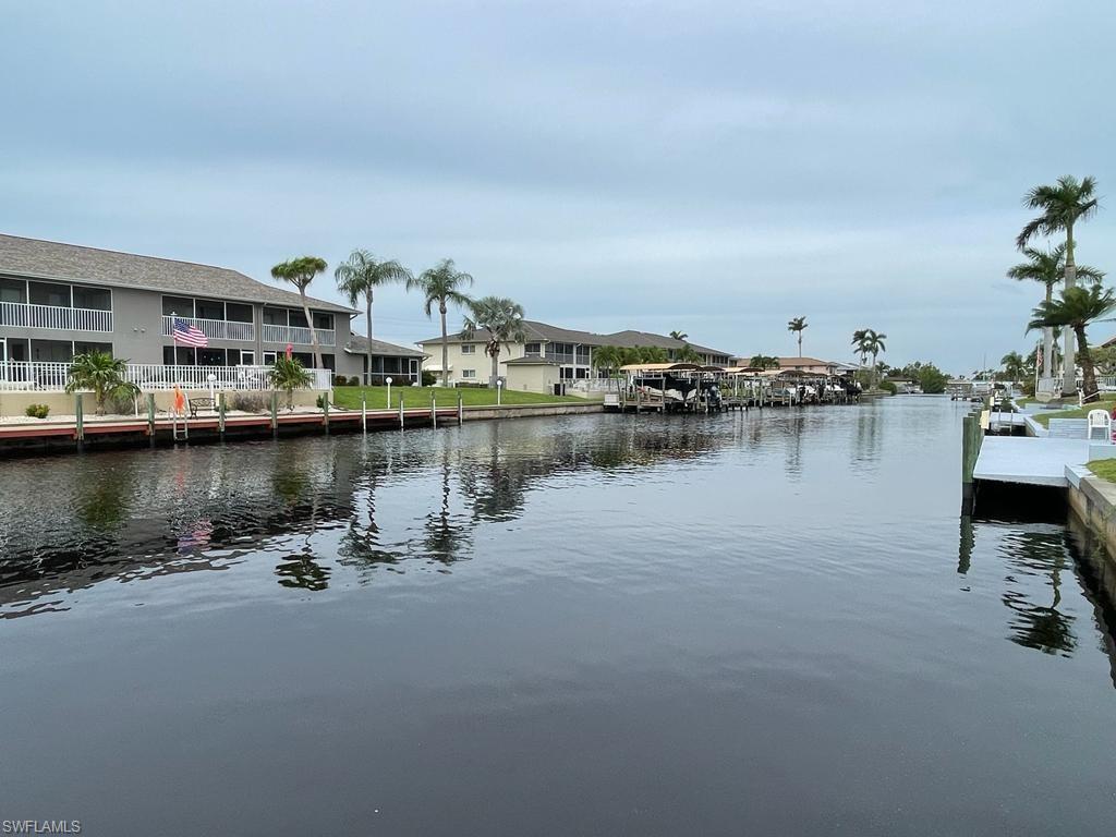 Water view featuring a dock