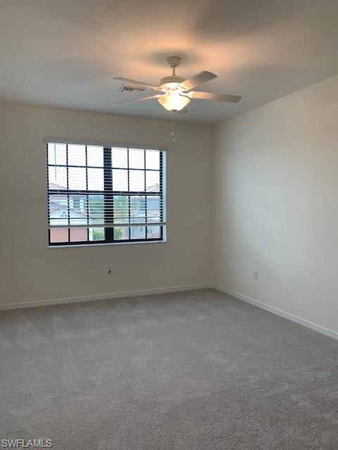 3rd Carpeted spare room featuring ceiling fan
