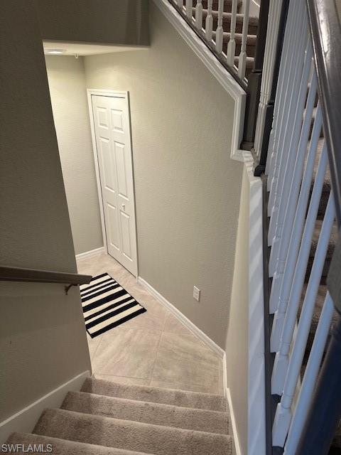 View of stairs from above living area