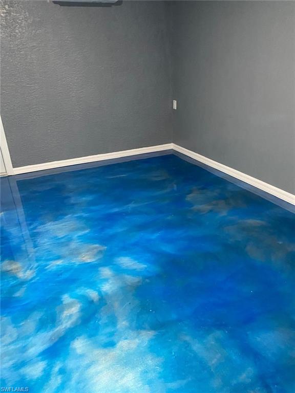 Empty room with concrete floors