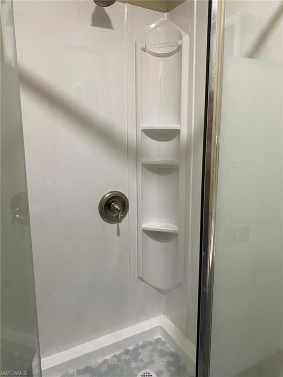 Bathroom featuring walk in shower