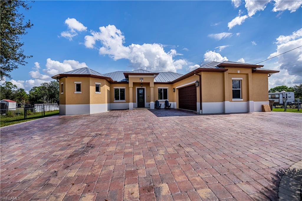 View of front of house with a garage