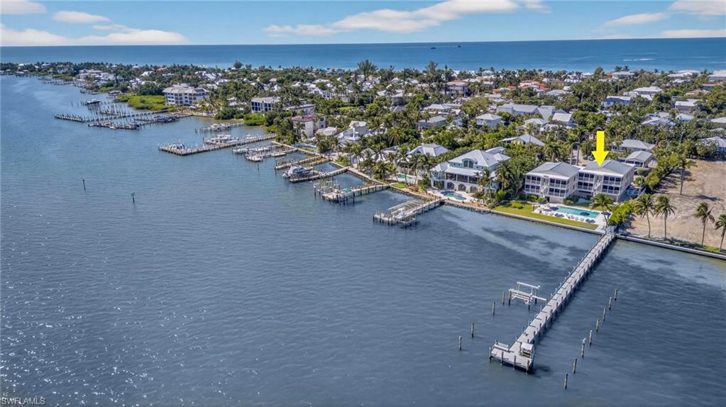 Bird's eye view of a marina and a large body of water