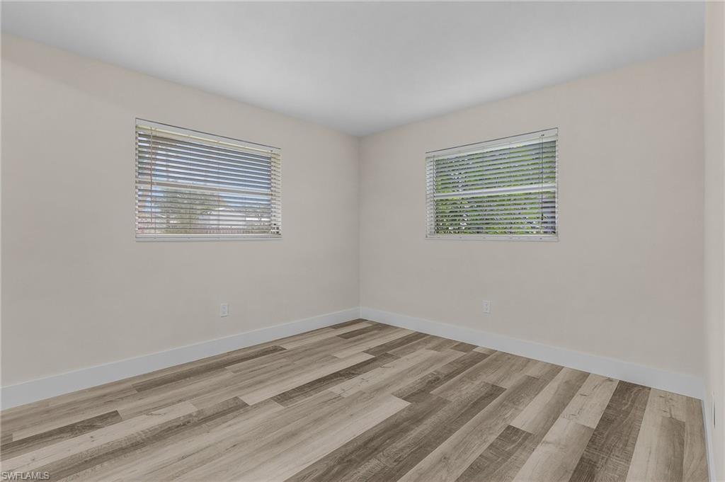 Spare room featuring light hardwood / wood-style flooring