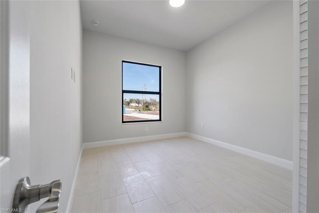 Empty room with baseboards