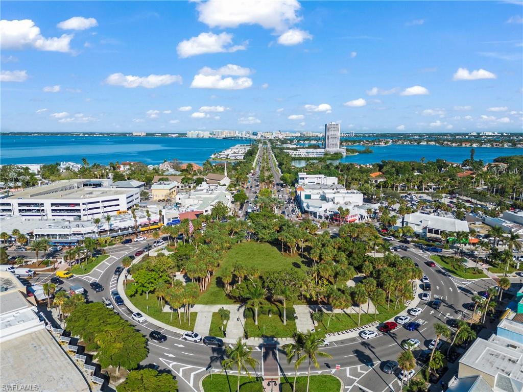 Bird-eye view of St. Armands Circle with a multitude of boutique shopping, restaurants, and a hub for community events.