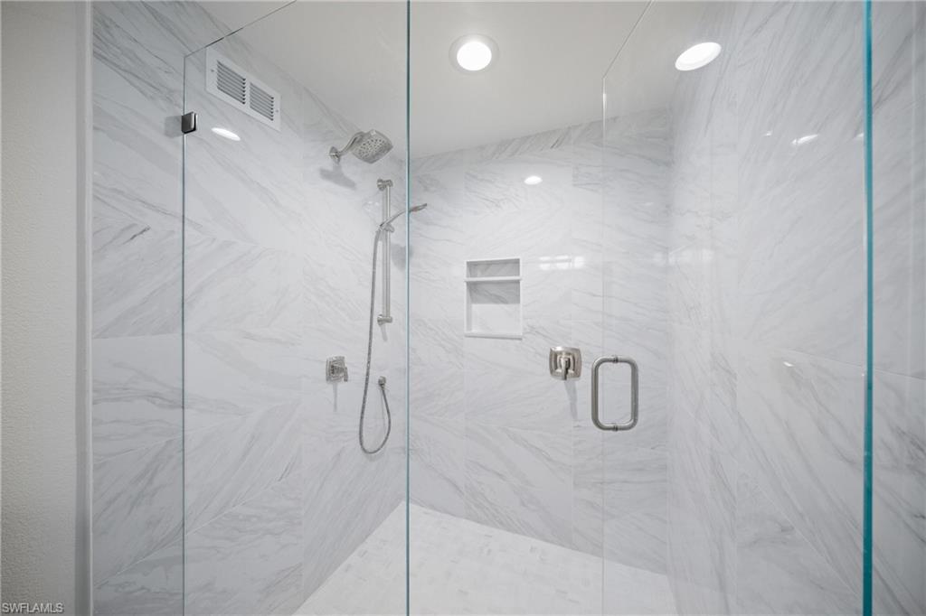 New guest room spacious shower.