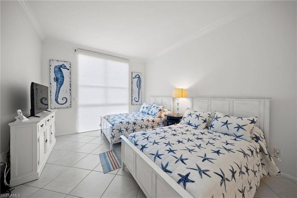 Guest bedroom with two full beds