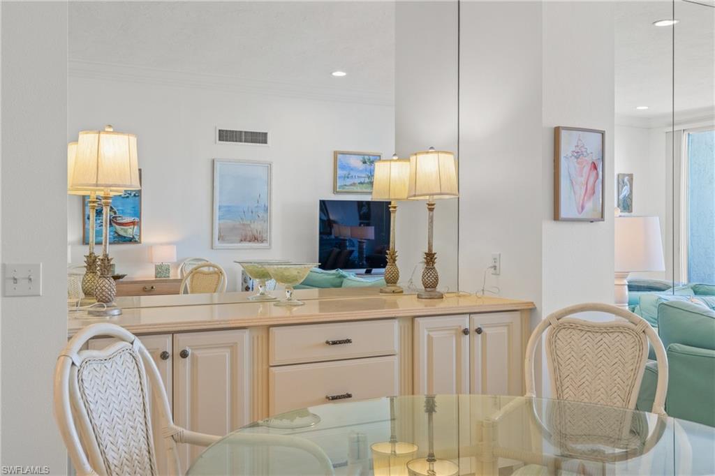 Dining area built-in buffet and mirrored wall