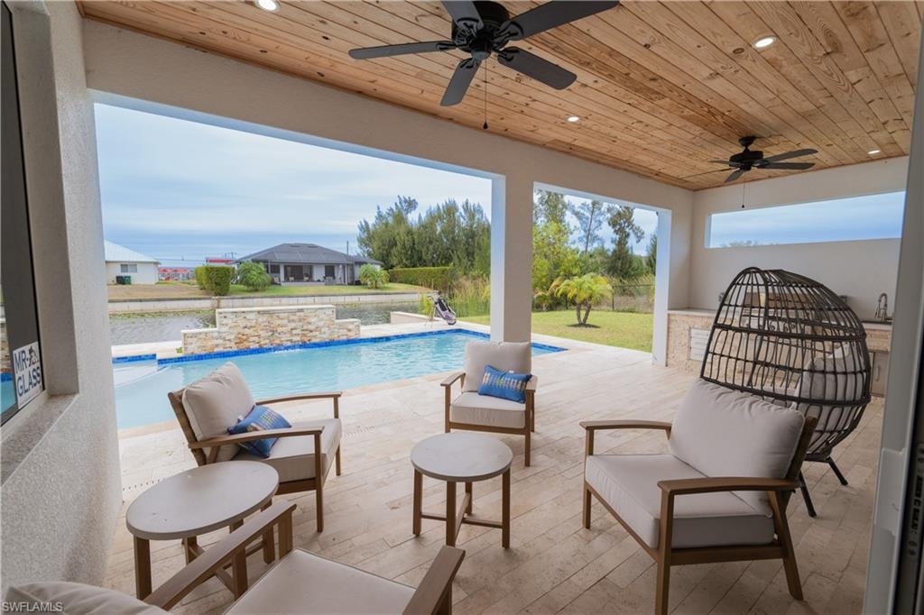 Outdoor pool featuring a patio and outdoor seating