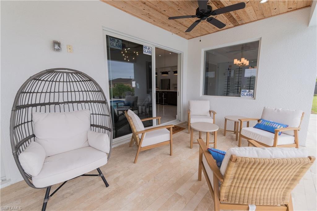 View of patio featuring ceiling fan and outdoor furniture