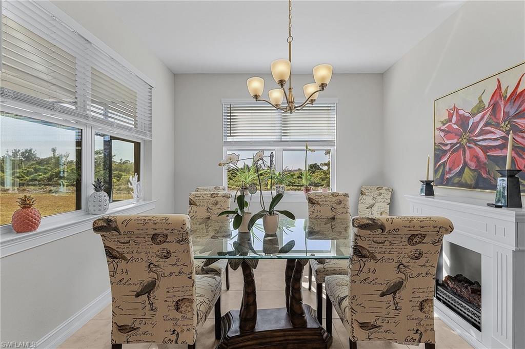 Dining area with a chandelier