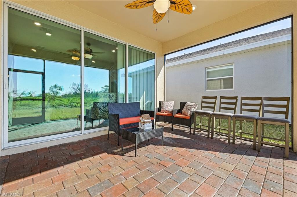 View of patio / terrace featuring ceiling fan and an outdoor hangout area