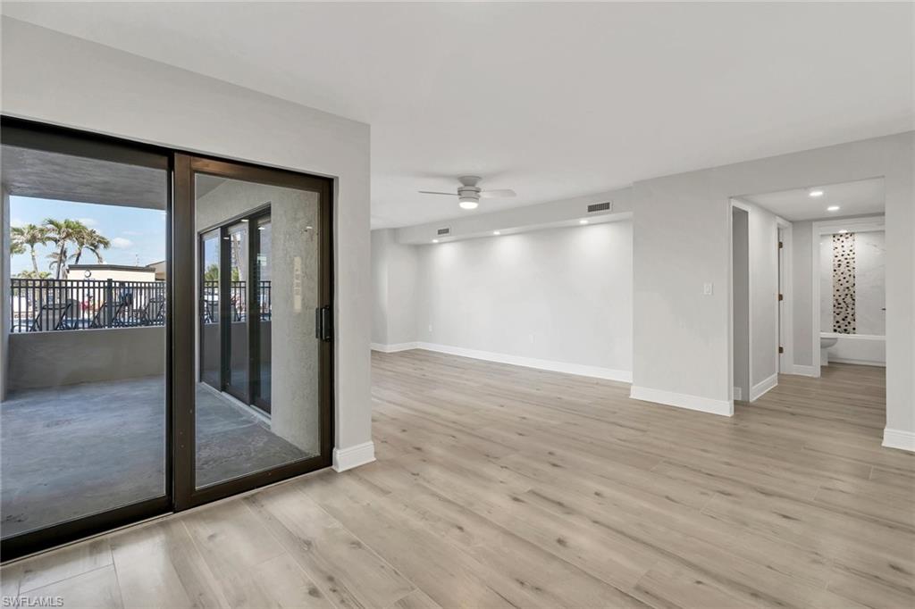 Looking down the hallway to split bedrooms