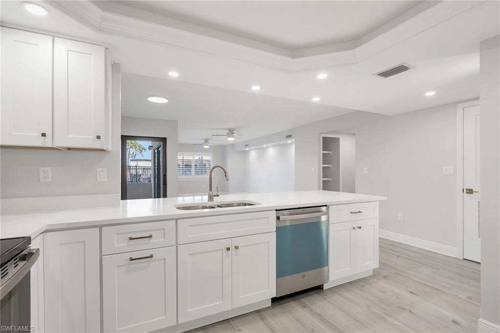Kitchen overlooking open floor plan, great for family and friends entertaining