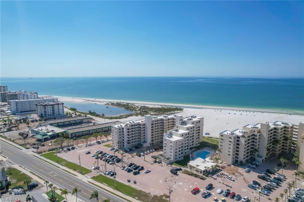 Bird's eye view featuring a water and beach view