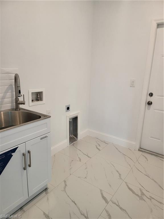 Washroom featuring cabinets, hookup for an electric dryer, sink, and washer hookup