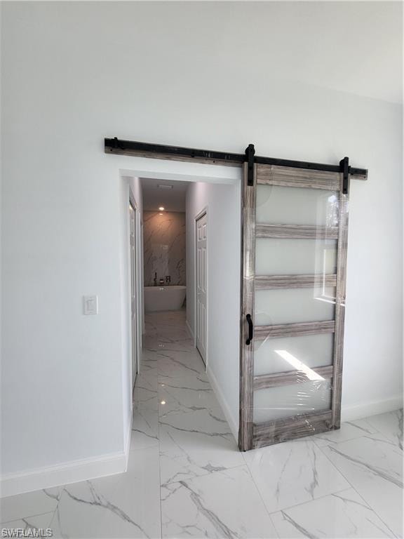 Corridor with a barn door