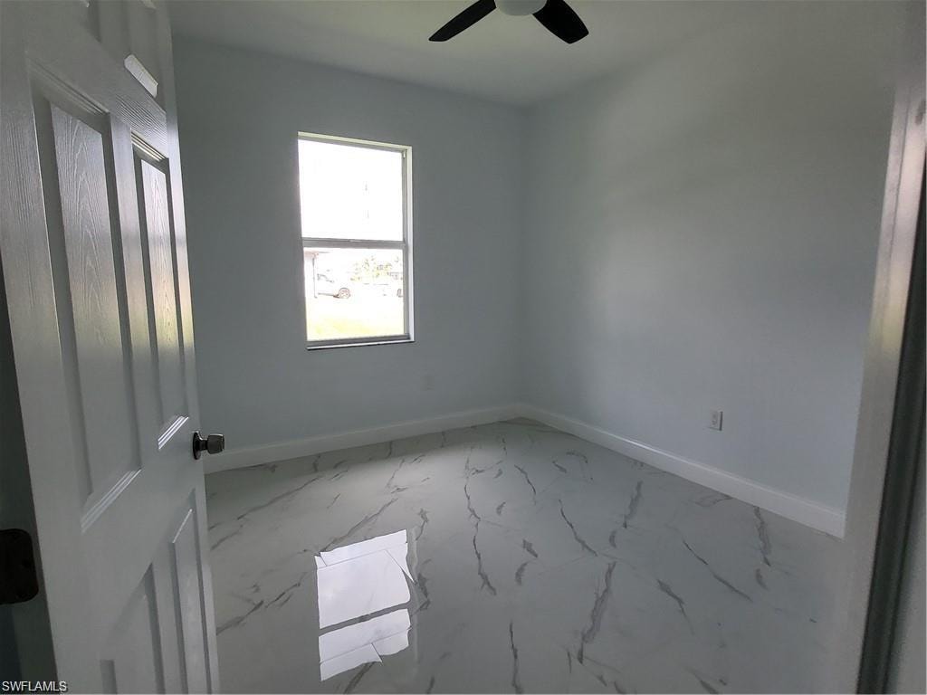 Unfurnished room with ceiling fan