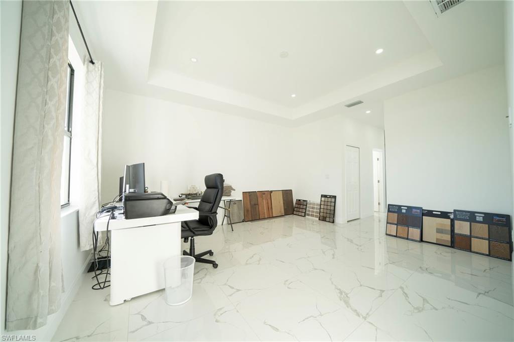 Office space with a raised ceiling