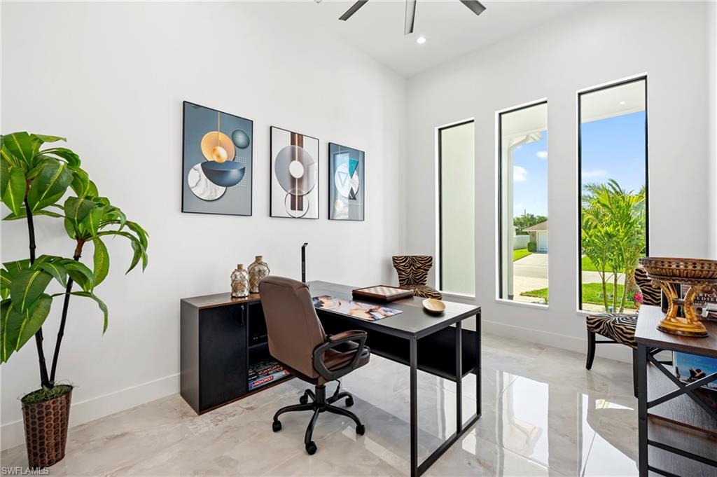 Office featuring recessed lighting, baseboards, and ceiling fan