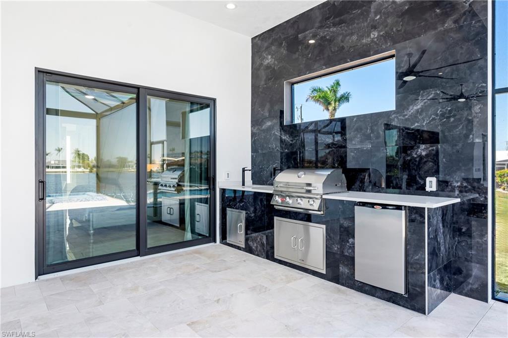 View of patio with area for grilling