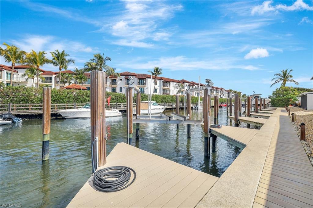 View of dock with a water view