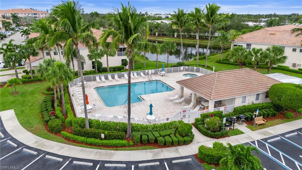 Pool featuring a patio area, and a water view