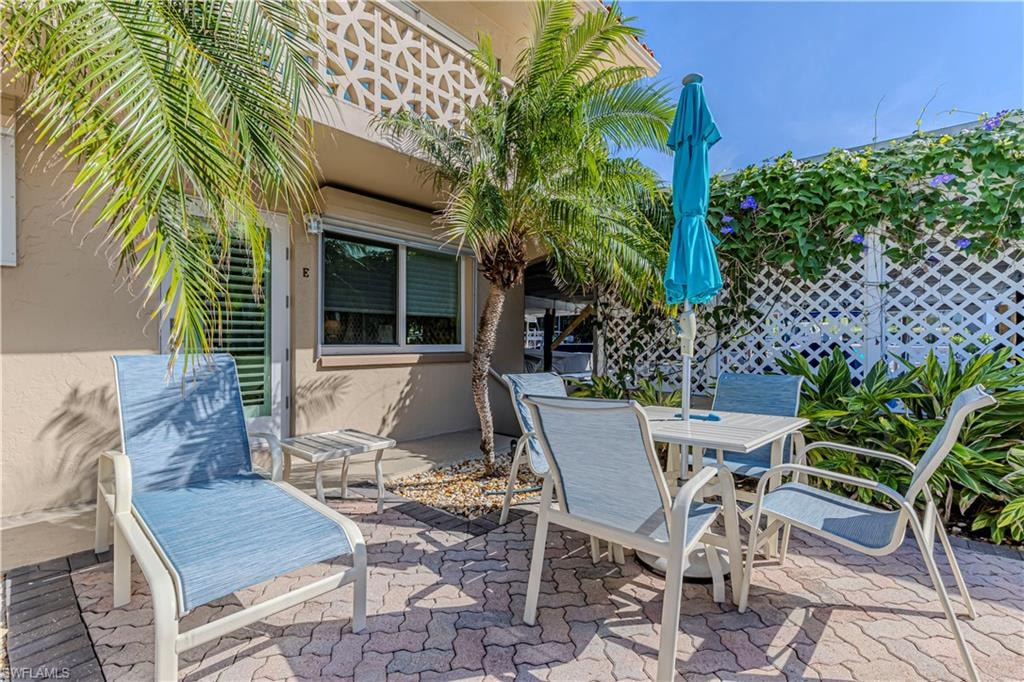 View of patio with outdoor dining area