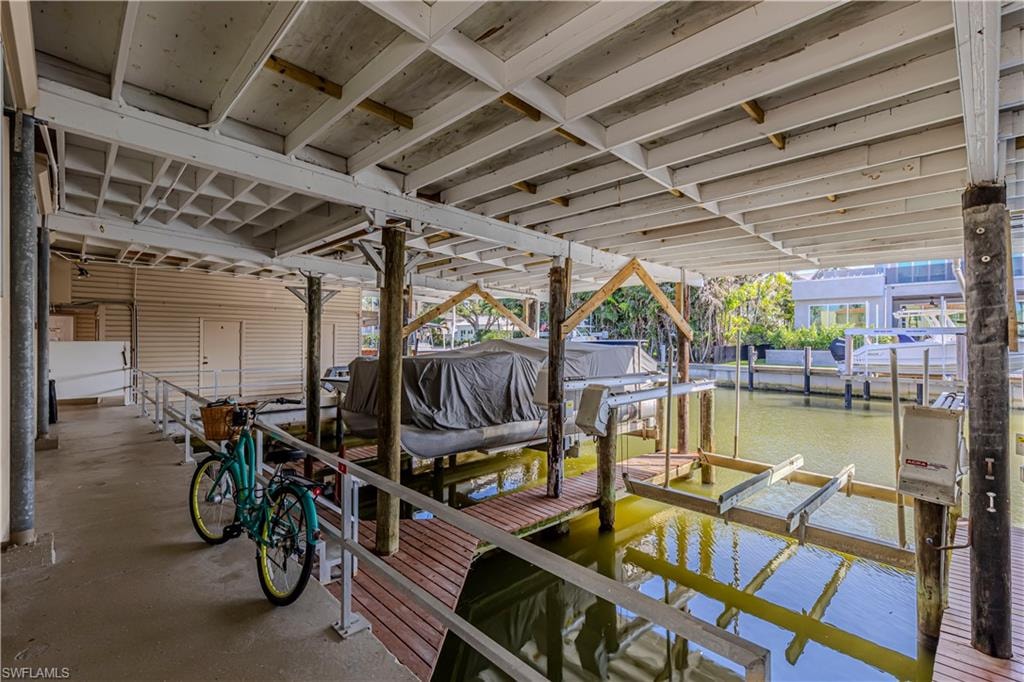 Dock area featuring boat lift