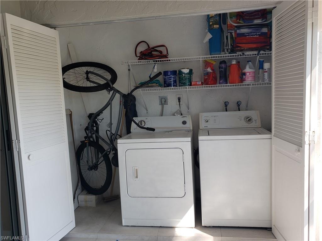 Laundry area with laundry area and separate washer and dryer