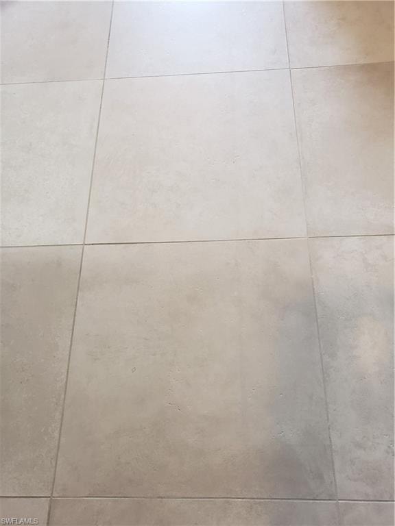 View of large format tile throughout condo