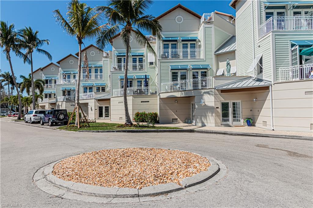View of property with a residential view