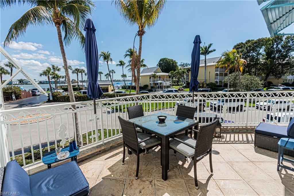 View of patio featuring outdoor dining area