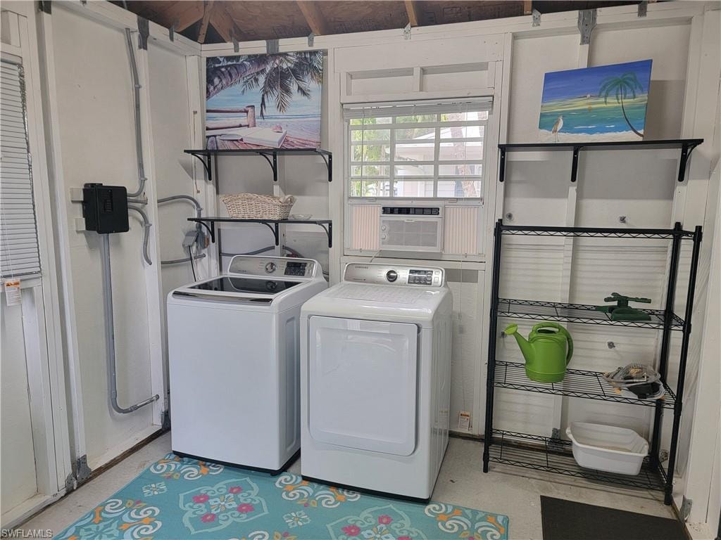 Clothes washing area with laundry area, separate washer and dryer, and cooling unit
