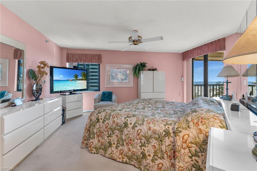 Bedroom featuring carpet, access to outside, and ceiling fan
