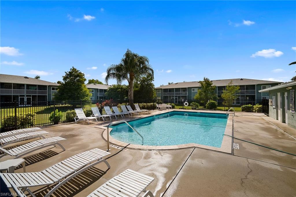 Community pool with a patio area